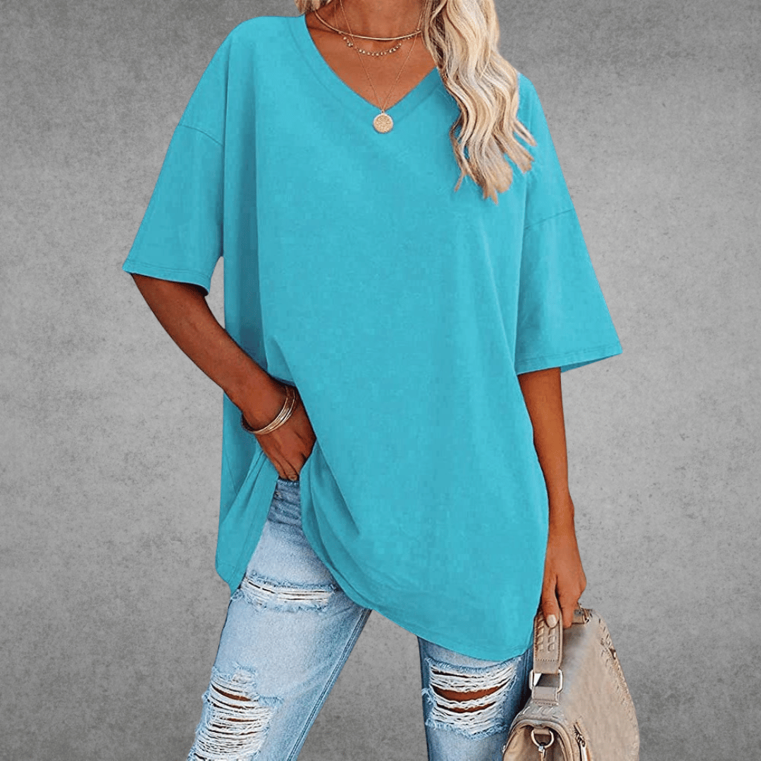 Design a comfort di t-shirt oversize ninon con un collare V & Fabric leggero e traspirante