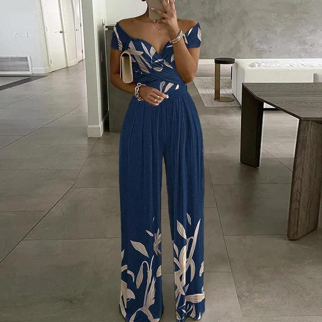 Combinazione da donna Lilibeth - eleganti spalle nude su una gamba larga e una cintura