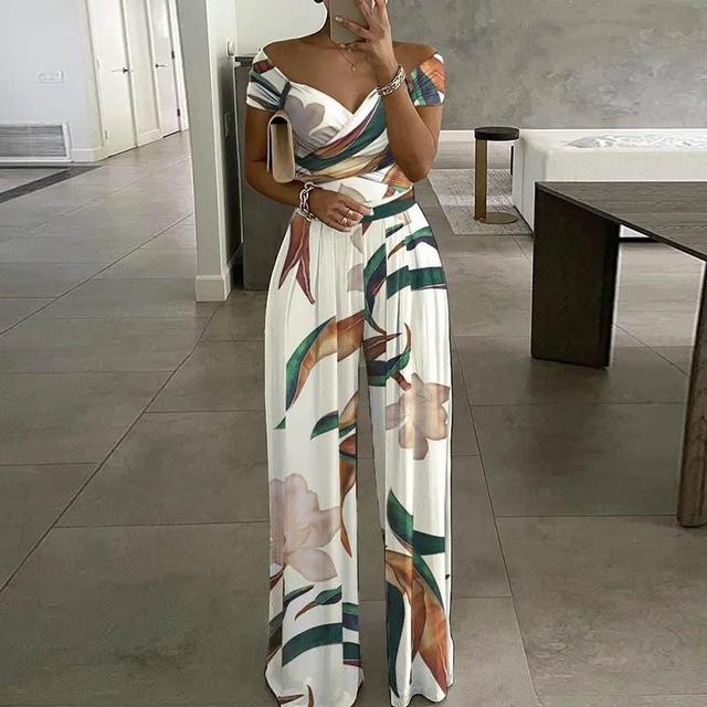 Combinazione da donna Lilibeth - eleganti spalle nude su una gamba larga e una cintura