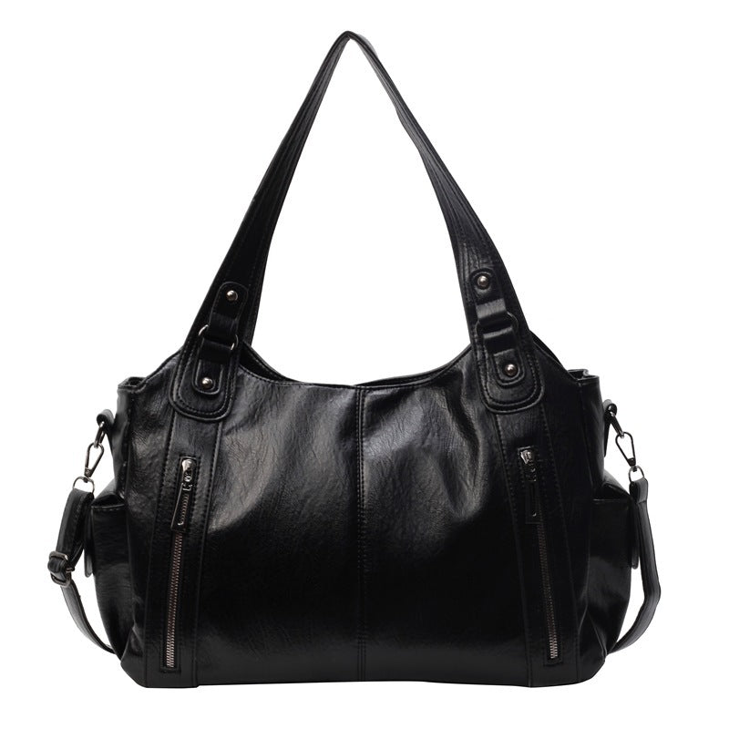 Dakota Dámska crossbody taška – Elegantná kožená taška s nastaviteľným popruhom a priestranným dizajnom